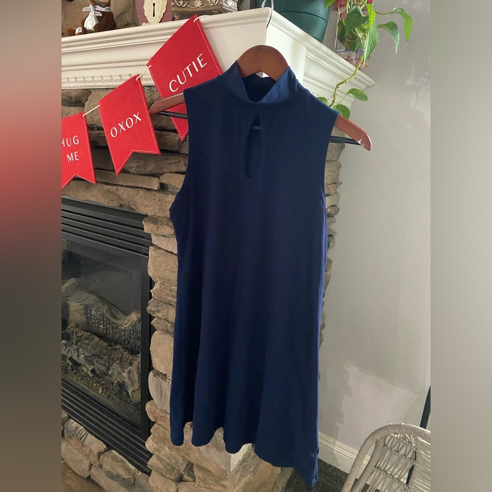 Juniors dress sleeveless with eye let opening
